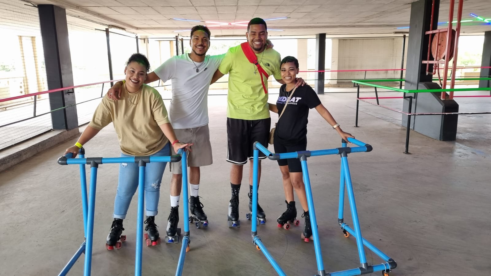 Kids learning to skate with free support frames